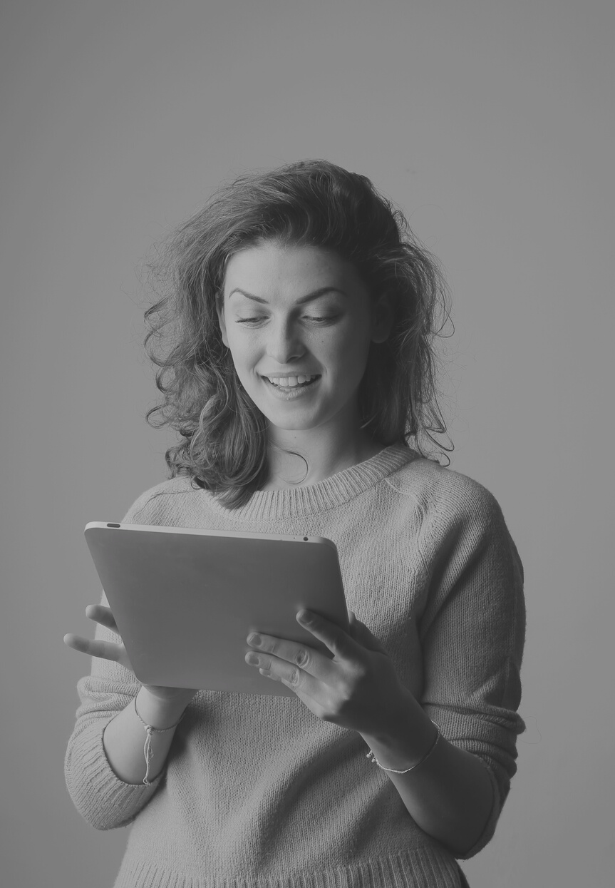 Woman in Yellow Sweater Holding Silver Ipad